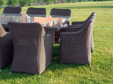 Poltrona con cuscino da esterno in midollino classico