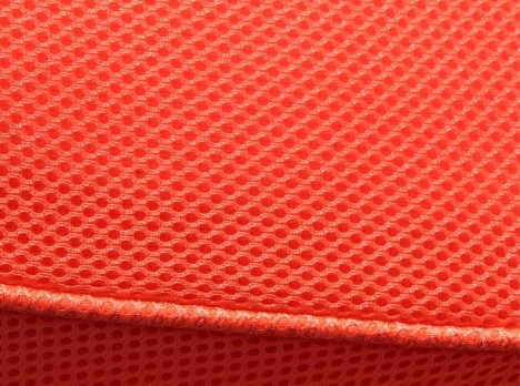 Dettaglio tessuto colorato per piscina arancione