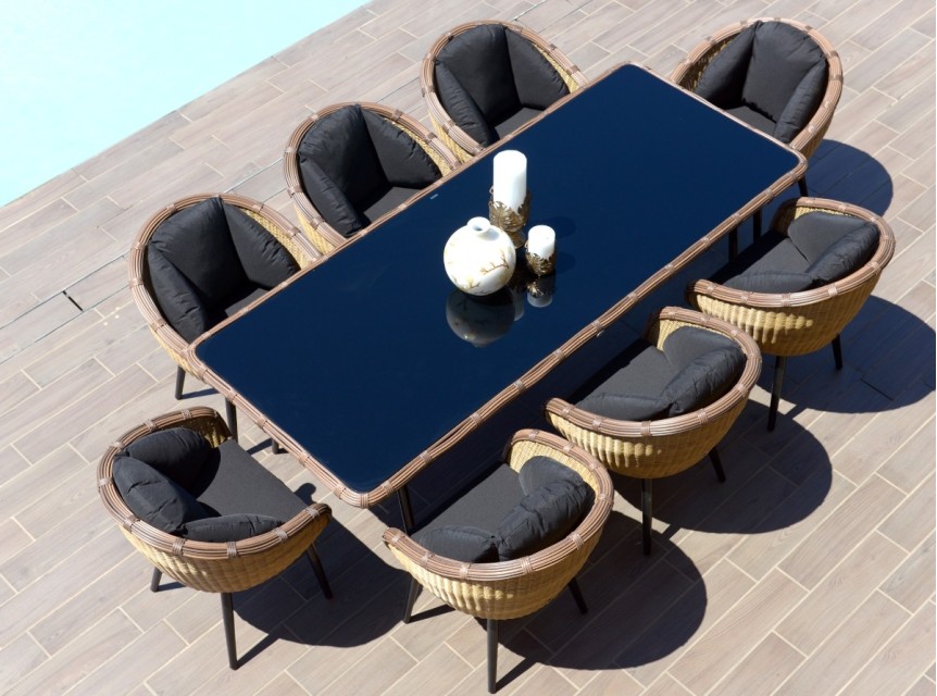 Tavolo per esterni di design in fibra tonda con otto poltrone